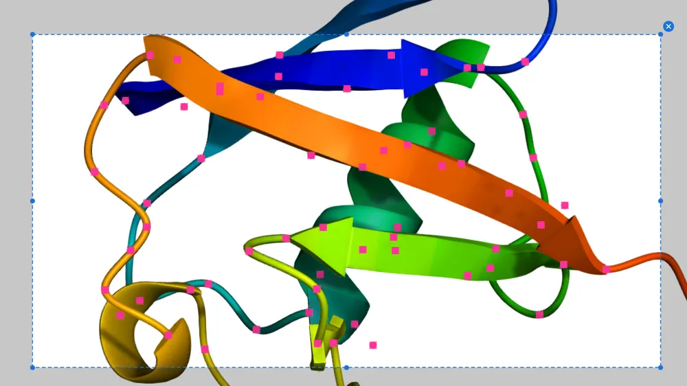 A dashed selection box dragged over a rainbow cartoon, with selected atoms highlighted