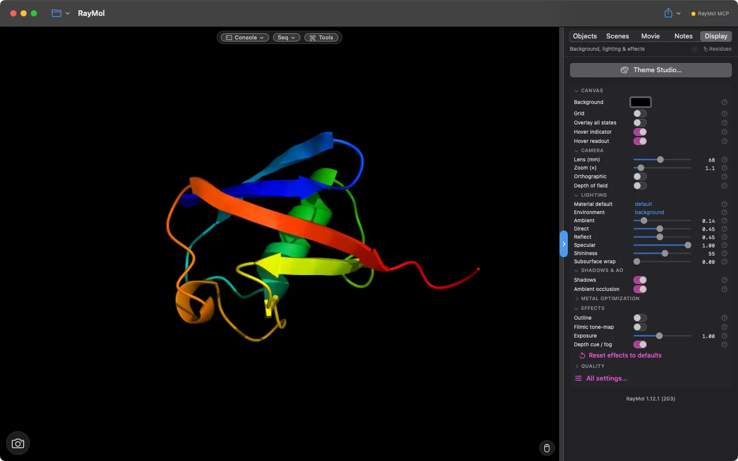 Inspector Display tab showing the Theme Studio button and the Canvas, Camera, Lighting, Shadows &amp; AO and Effects groups next to a rainbow ubiquitin cartoon